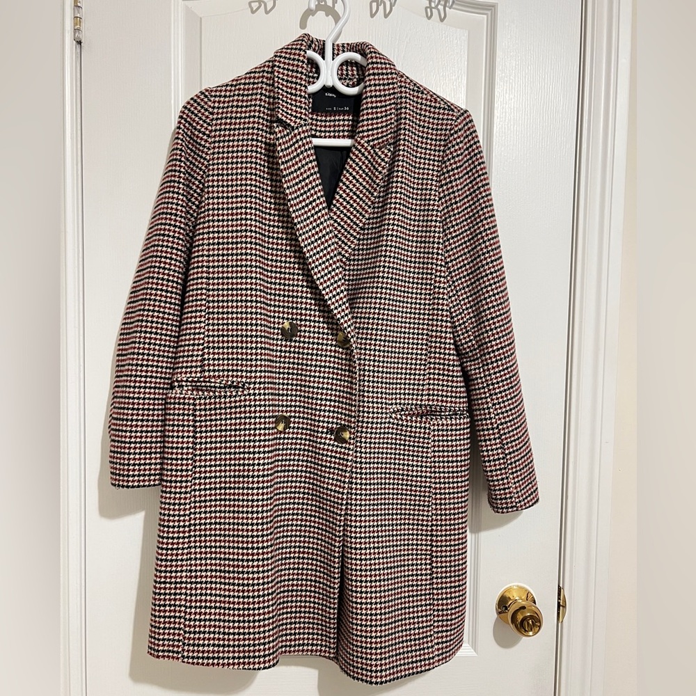 Elegant Coat in Black, White, and Red